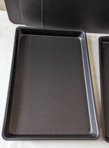 lot 242 image: Assorted Cooks Essentials Cookie Sheets and Baking Pans