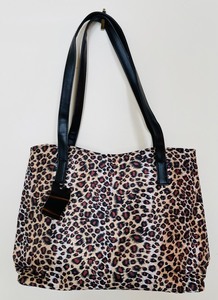 lot 435 image: New Animal Print Rolling Backpack and Matching Handbag
