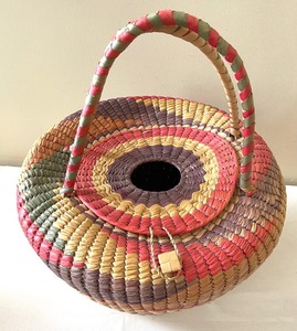 lot 443 image: Marvelous Multi-Colored Woven Basket with Handle