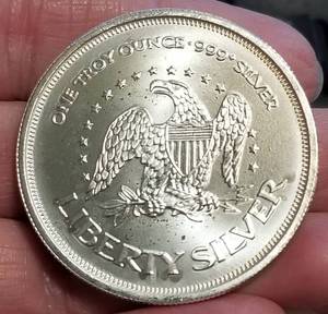 1 TROY OZ .999 FINE SILVER A-MARK ROUND