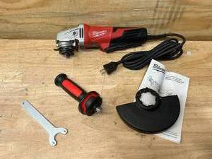lot 105 image: MILWAUKEE 13 Amp 6 in. Small Angle Grinder with Paddle Switch