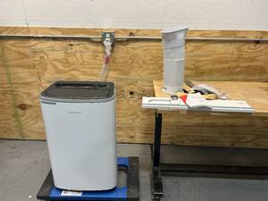 lot 110 image: FRIGIDAIRE 14,000 BTU HeatCool Portable Room Air Conditioner with Dehumidifier in White