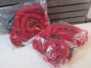 2 Red Expanding Garden Water Hoses...