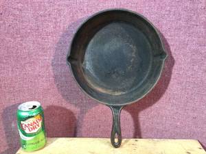 lot 77 image: Early Cast Iron Skillet - Heat RimGate Leg