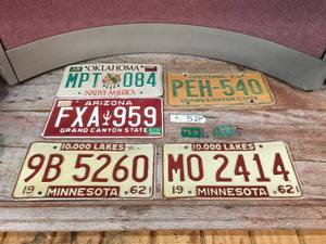 lot 114 image: Vintage Automotive License Plates - Tabs