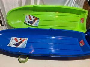 lot 31 image: 2 Snow sleds Blue & Lime Green