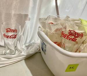 lot 35 image: Bin w 16 Red Logo Coca Cola Glasses