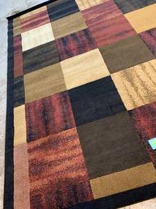lot 49 image: LG Brown Red Area Rug 710 x 10