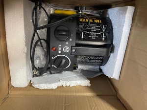 lot 6 image: Utility Fan Heater customer return review pictures