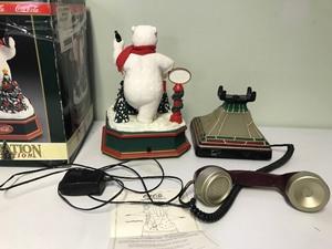 lot 57 image: Coca Cola phone and Coca Cola polar bear from the animation collection