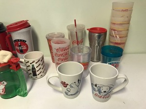 lot 71 image: Lot of Coca Cola soft drinking cups, coffee mugs and more