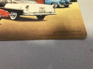 lot 100 image: 3 Coca Cola metal signs and 2 vinyl placemats