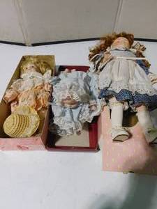 lot 207 image: 1986 Brinn porclean doll, Musical porclean and red haired porclean doll