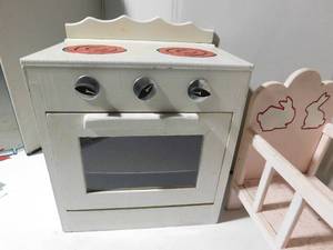 lot 215 image: Childs stove and cradle (wood)