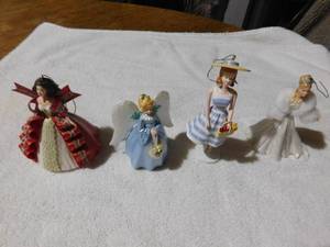 lot 235 image: 3 hallmark Barbie ornaments and a Hallmark angel tree topper