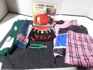 lot 250 image: Dog sweaters, coats, leash and clippers