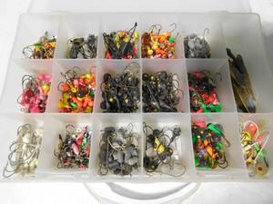 lot 259 image: Tackle box of lead head jigs