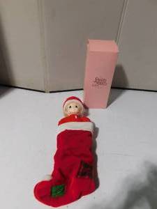lot 203 image: 1998 Precious moment doll in a stocking