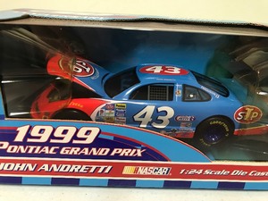 lot 380 image: 1999 NASCAR Racing Champions 50th Anniversary 1999 Pontiac Grand Prix John Andretti #43 scale 124.