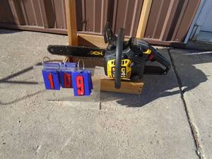 McCollough Mac3214. Used condition. Good runner. Bought a bigger saw. As shown.