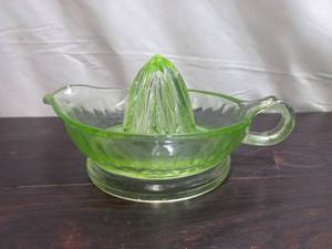 lot 84 image: Vintage Vaseline Glass Juicer