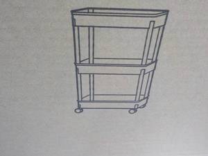 lot 84 image: 2 Tier Organizer needs assembly...