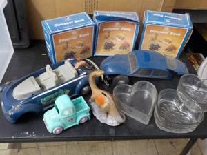 lot 31 image: Vintage Toys and Glassware in a cov...