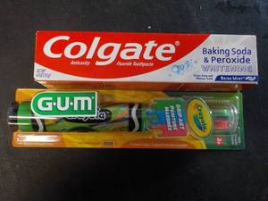 lot 300 image: GUM Power Toothbrush and Toothpaste...