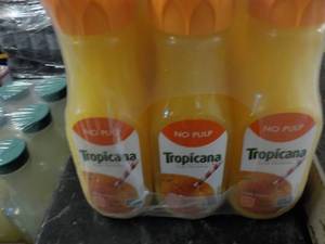 lot 415 image: 12 pack 12 oz Tropicana...