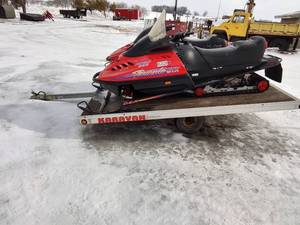 Two Ski Doo Snowmobiles with Aluminum Trailer