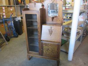 lot 1 image: (FRNT) Nice Old Wood Cabinet with G...