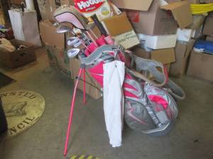 lot 73 image: (BSB) Ladies Pink Golf Clubs and Ba...
