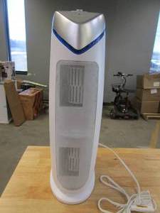 lot 297 image: Germ Guardian Air Purifier with HEPA 13 Filter, Removes 99.97% of Pollutants, Covers Large Room up to 743 Sq. Foot Room in 1 Hr, UV-C Light Helps Reduce Germs, Zero Ozone Verified, 22, White, AC4825W (FRONT WIRE SCREEN IS SLIGHTLY DENTED)