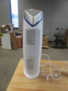 lot 298 image: Germ Guardian Air Purifier with HEPA 13 Filter, Removes 99.97% of Pollutants, Covers Large Room up to 743 Sq. Foot Room in 1 Hr, UV-C Light Helps Reduce Germs, Zero Ozone Verified, 22, White, AC4825W (FRONT WIRE SCREEN IS SLIGHTLY DENTED)