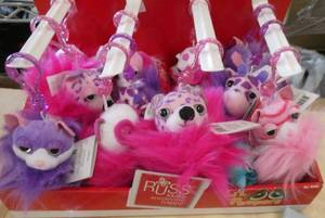 lot 25 image: 4 cases of 12 Peepers to hang on backpacks, 3 Fuzzy and 1 regular