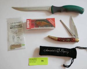 lot 79 image: New filet knife, Rapala lure, filet and scale pocket knife