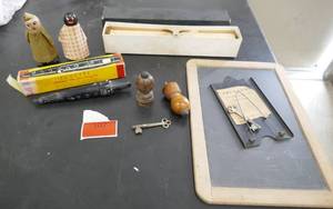 lot 107 image: Vintage grouping of an old chalkboard, key, Tonette, player piano roll and 2 cone dolls