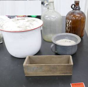 lot 110 image: Vintage gallon bottles, cheese box, enamelware pots