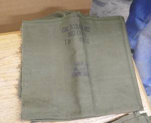 lot 135 image: Twelve  .30 Caliber Clip WrapsBags 1953
