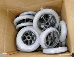 lot 178 image: Box full of about 25 wheelchair wheels