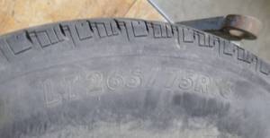 lot 289 image: Firestone Transforce Tire on rim LT26575R16
