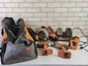 lot 546 image: RIDGID 18V Cordless Tools - Circular Saw, 14 Impact. Drill, Flashlight, Charger, Tote bag and (3) Batteries - NO SHIPPING