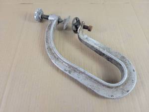 lot 561 image: Vintage Tire Patch Pressure Clamp