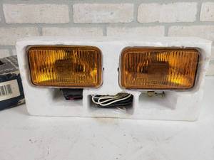 lot 670 image: NIGHT BLASTER Quartz halogen Amber Fog Lights in Original Box - Part No. QH-13AK