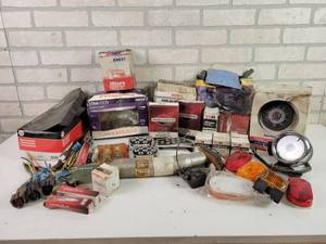 lot 716 image: Lot of Auto Parts, Marine Speedometer, Tack, Case Parts, Briggs & Stratton Parts and More