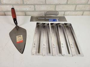 lot 826 image: (5) NEW Round 8 Files, Goldblatt 11 Brick Trowel and PaceSetter 14 Finish Trowel