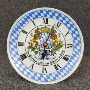 lot 787 image: NEW Backwards Bavarian Clock - Inscription translates to The Clocks Tick Differently in Bapern