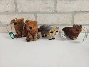 lot 615 image: (4) Kurt S. Adler Otter, Raccoon and Bear Christmas Ornaments