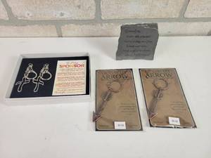 lot 729 image: Sponsor Cross Keyrings, Grandpa Metal Quote and God is my Arrow Keychains