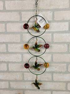 lot 741 image: (3) Evergreen Hummingbird 23 Outdoor Twirler